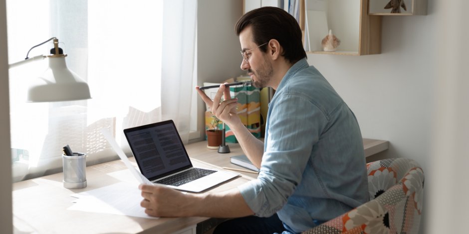 man working from home on laptop