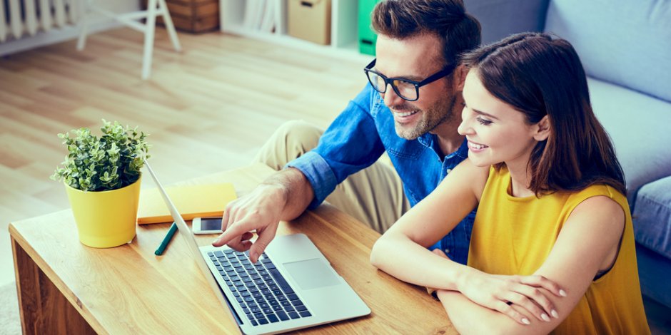 couple looking at houses online