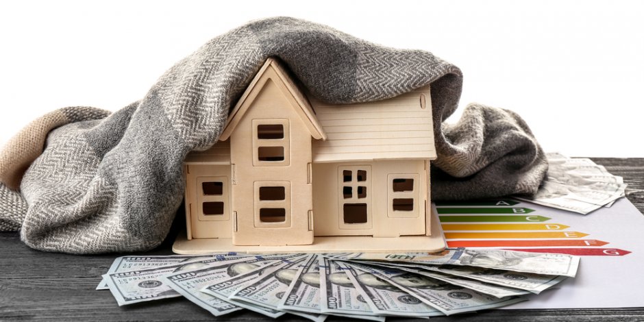 model home with energy analysis report, money, scarf, energy efficiency concept model home with energy analysis report, money, scarf, energy efficiency concept